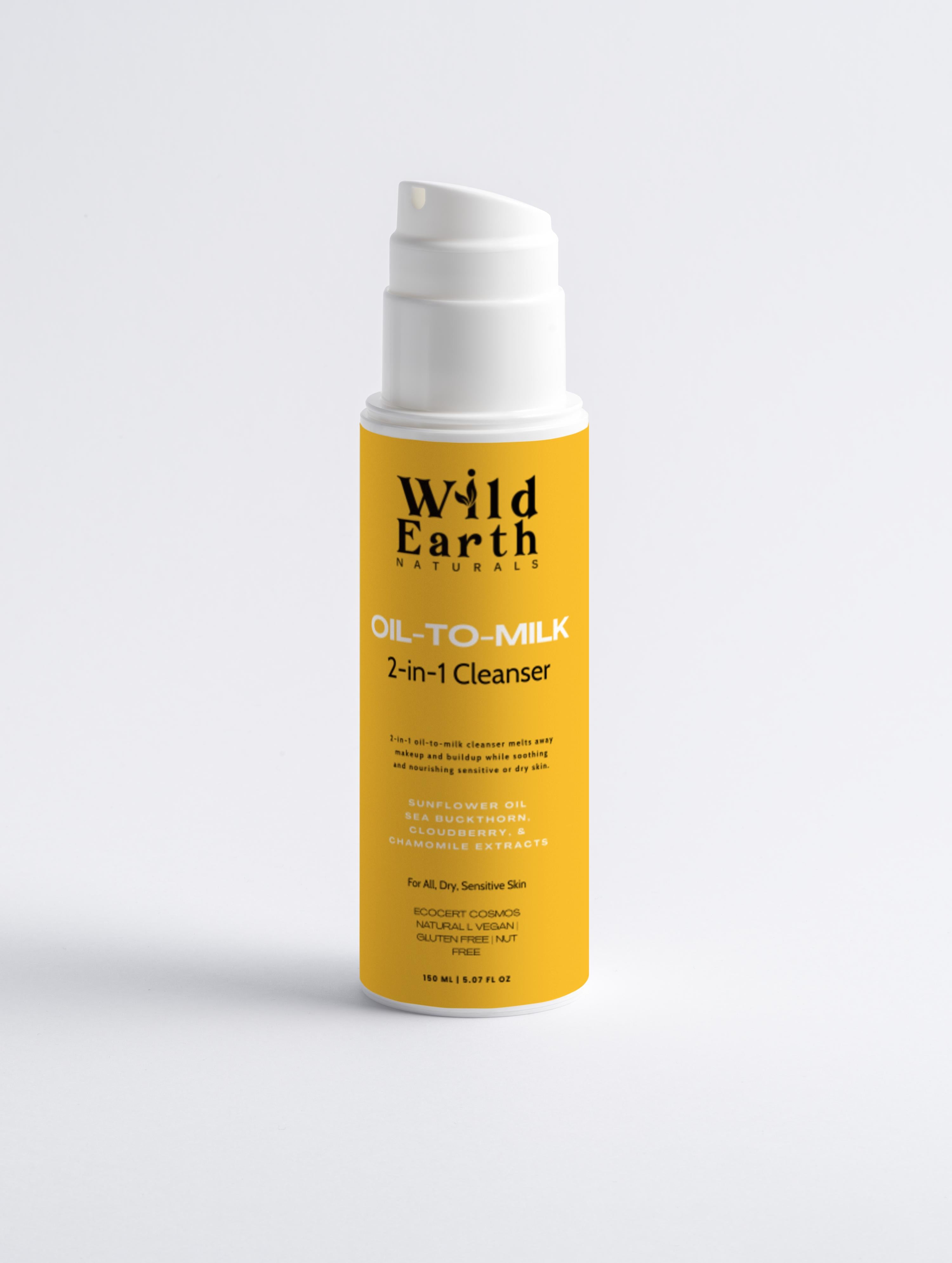 Yellow bottle of Wild Earth Naturals Oil-to-Milk 2-in-1 Cleanser on a light gray background
