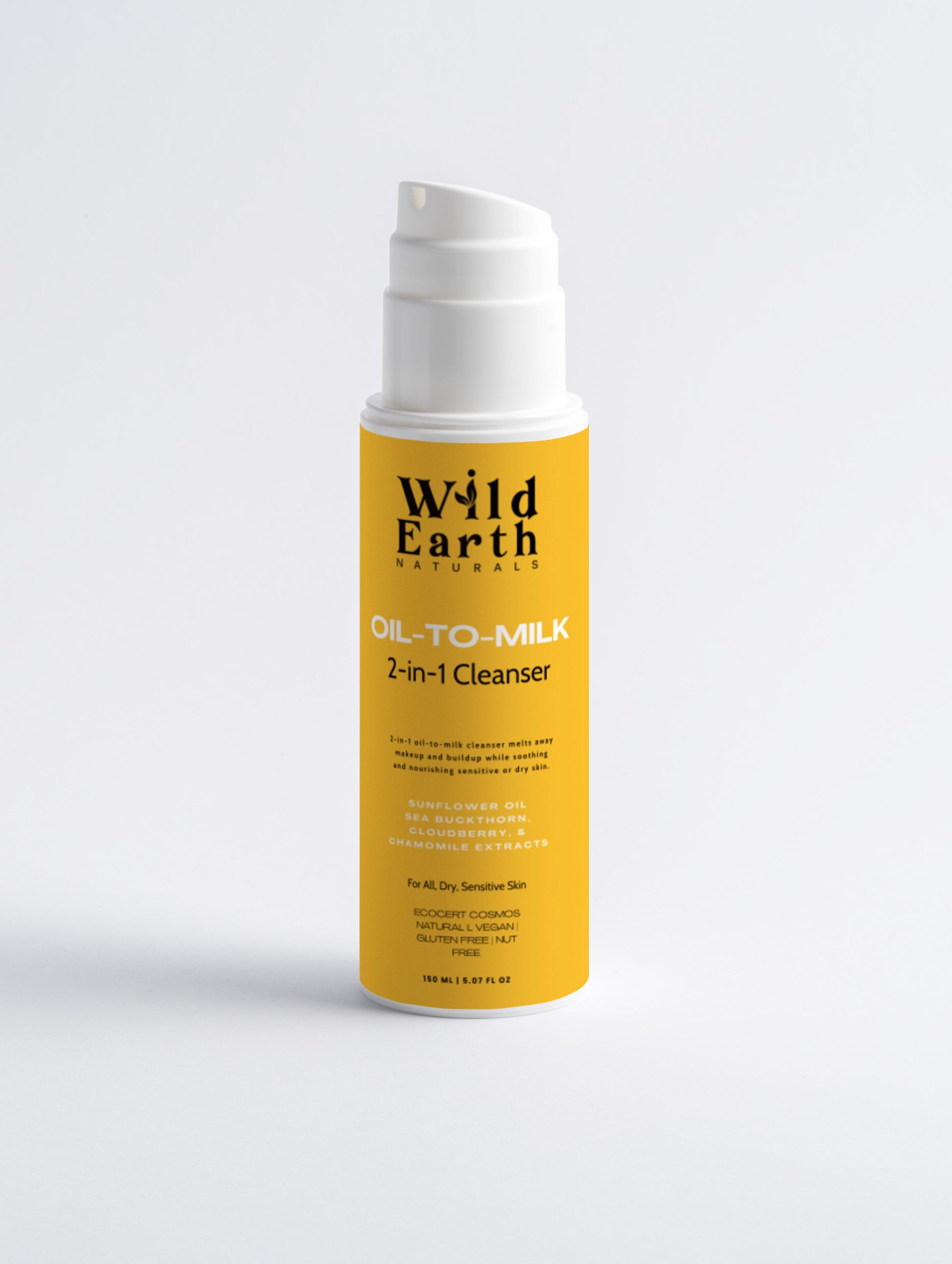 Yellow bottle of Wild Earth Naturals Oil-to-Milk 2-in-1 Cleanser on a light gray background