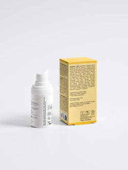 Skincare bottle and packaging on a white background