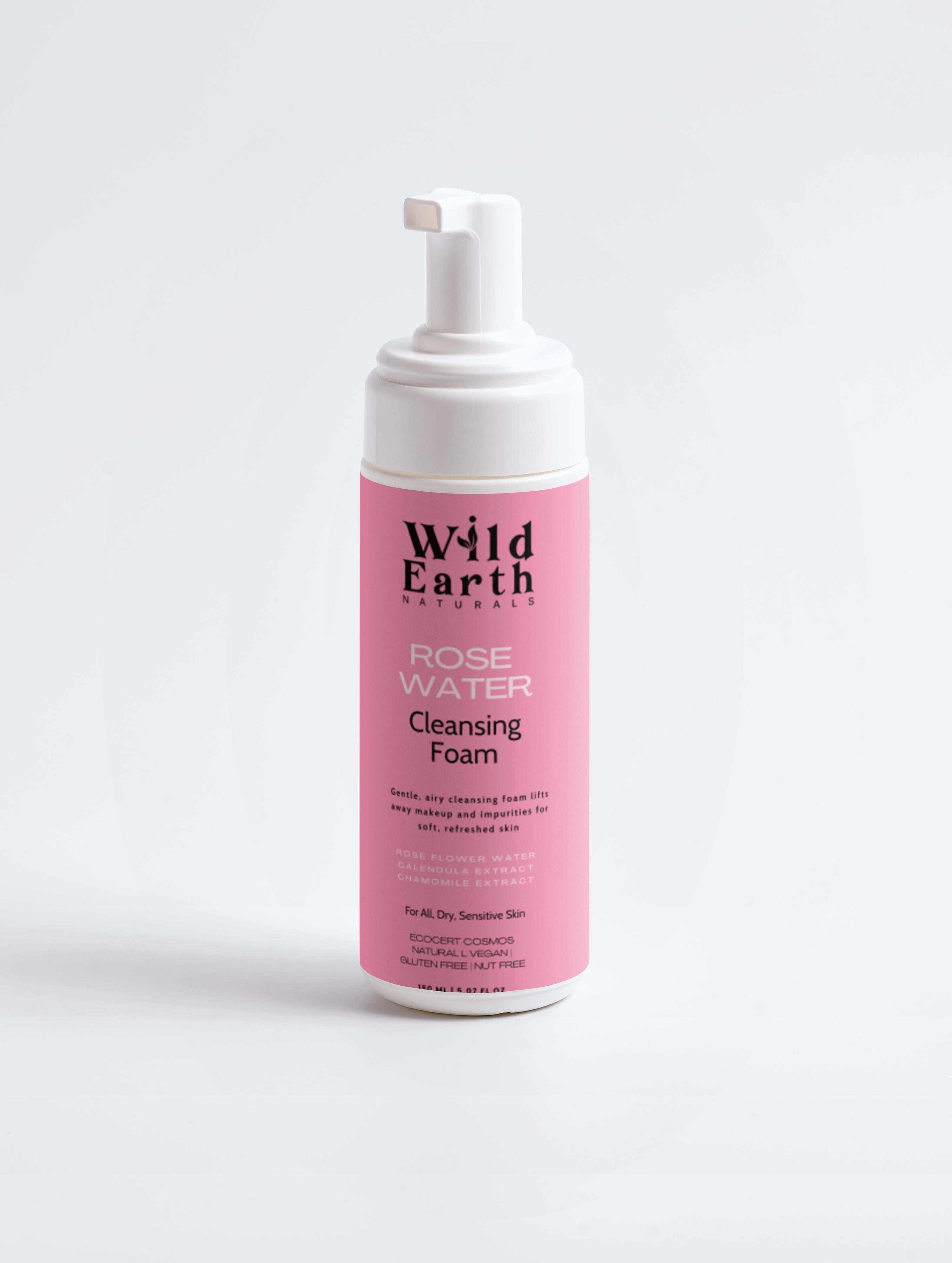 Wild Earth Rose Water Cleansing Foam bottle on a light gray background